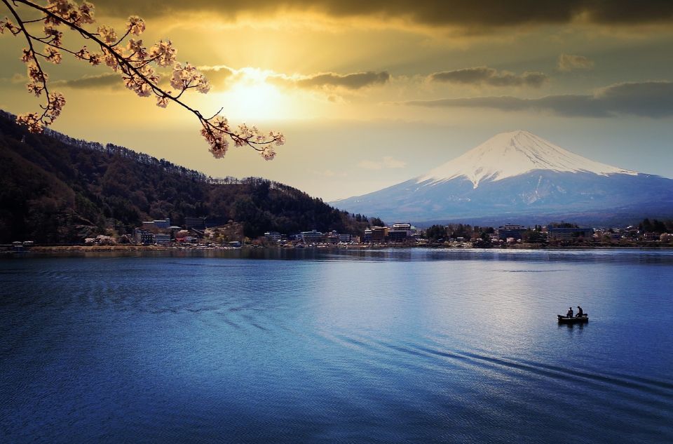 Scenic view of Mount Fuji with lake reflection at sunset